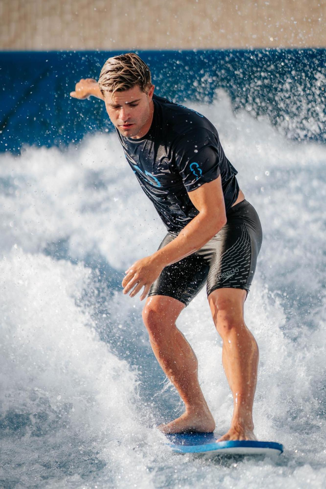 City Of Dreams Mediterranean - Integrated Resort, Casino & Entertainment Limassol Kültér fotó A surfer wearing a wetsuit